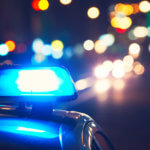 Police officer pulling over a vehicle.