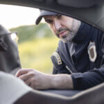 A police officer speaks to person who got pulled over